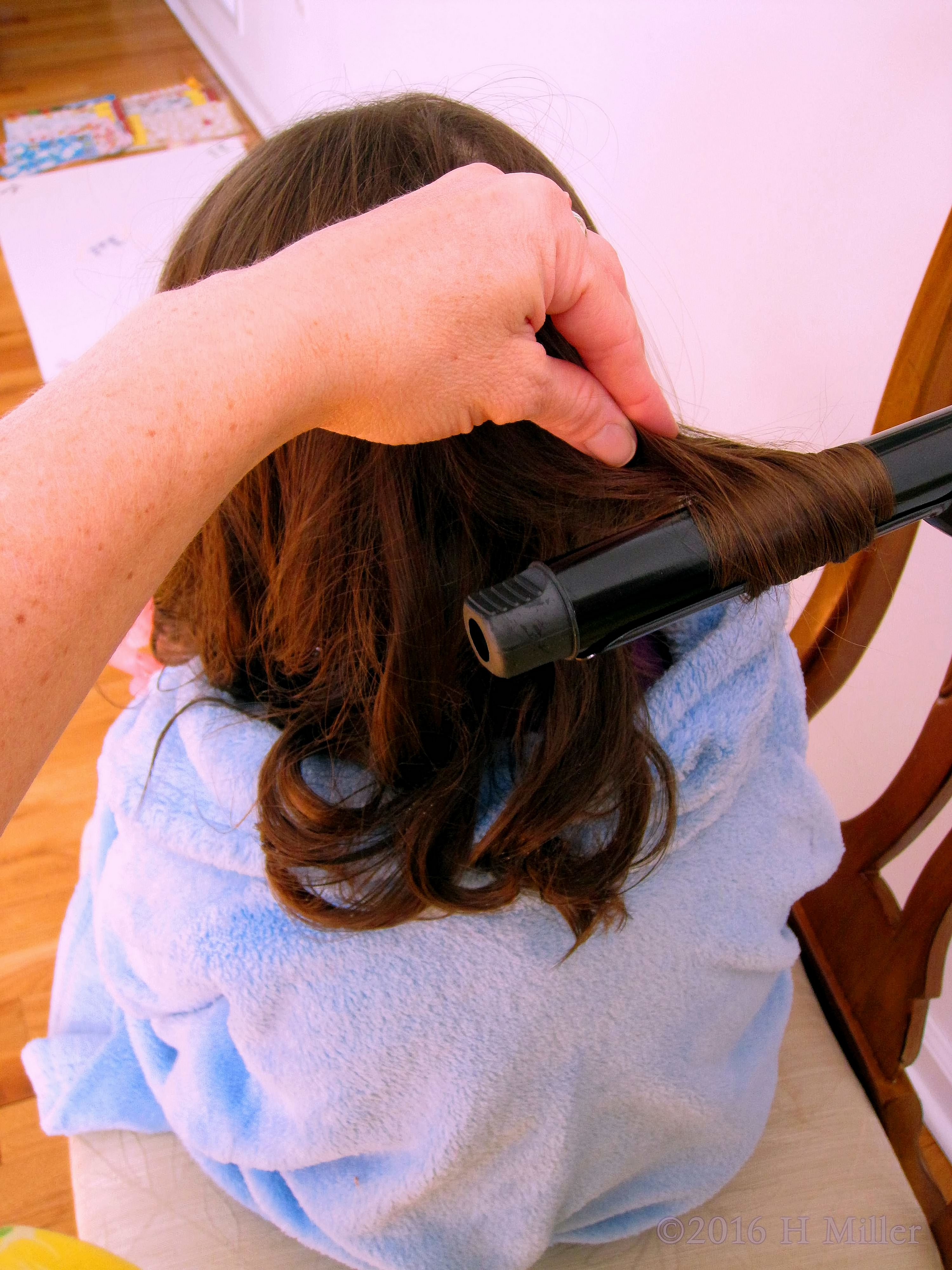 Girl Having Her Hair Styled. Looks Like Fun! Girl Having Her Hair Styled. Looks Like Fun!