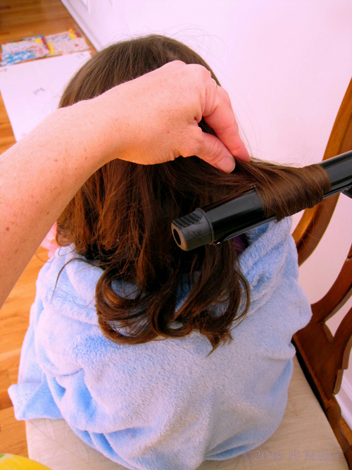 Girl Having Her Hair Styled. Looks Like Fun! Girl Having Her Hair Styled. Looks Like Fun!