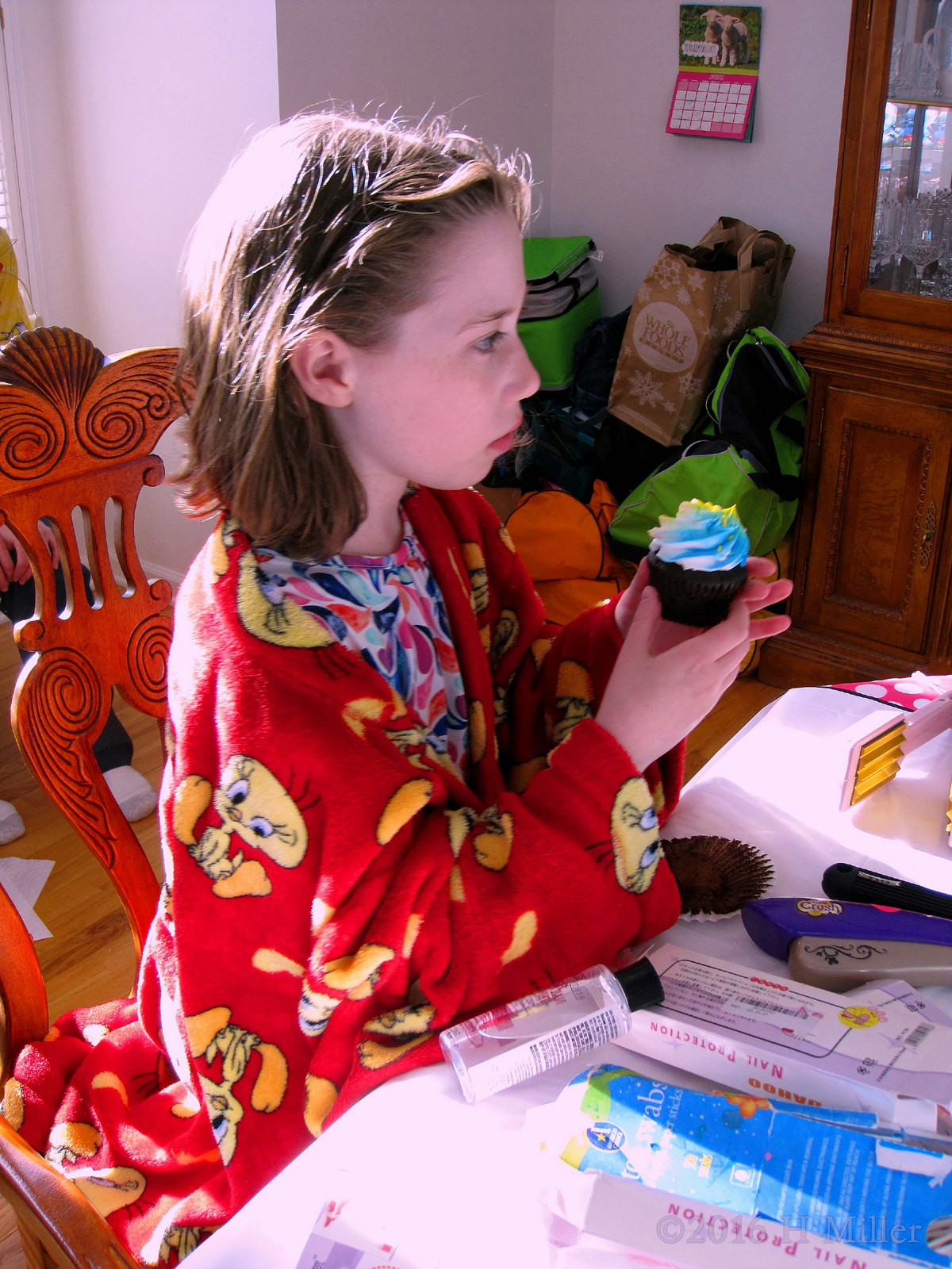 Tara Enjoying Her Bright Blue Cupcake At Her Spa Party! 