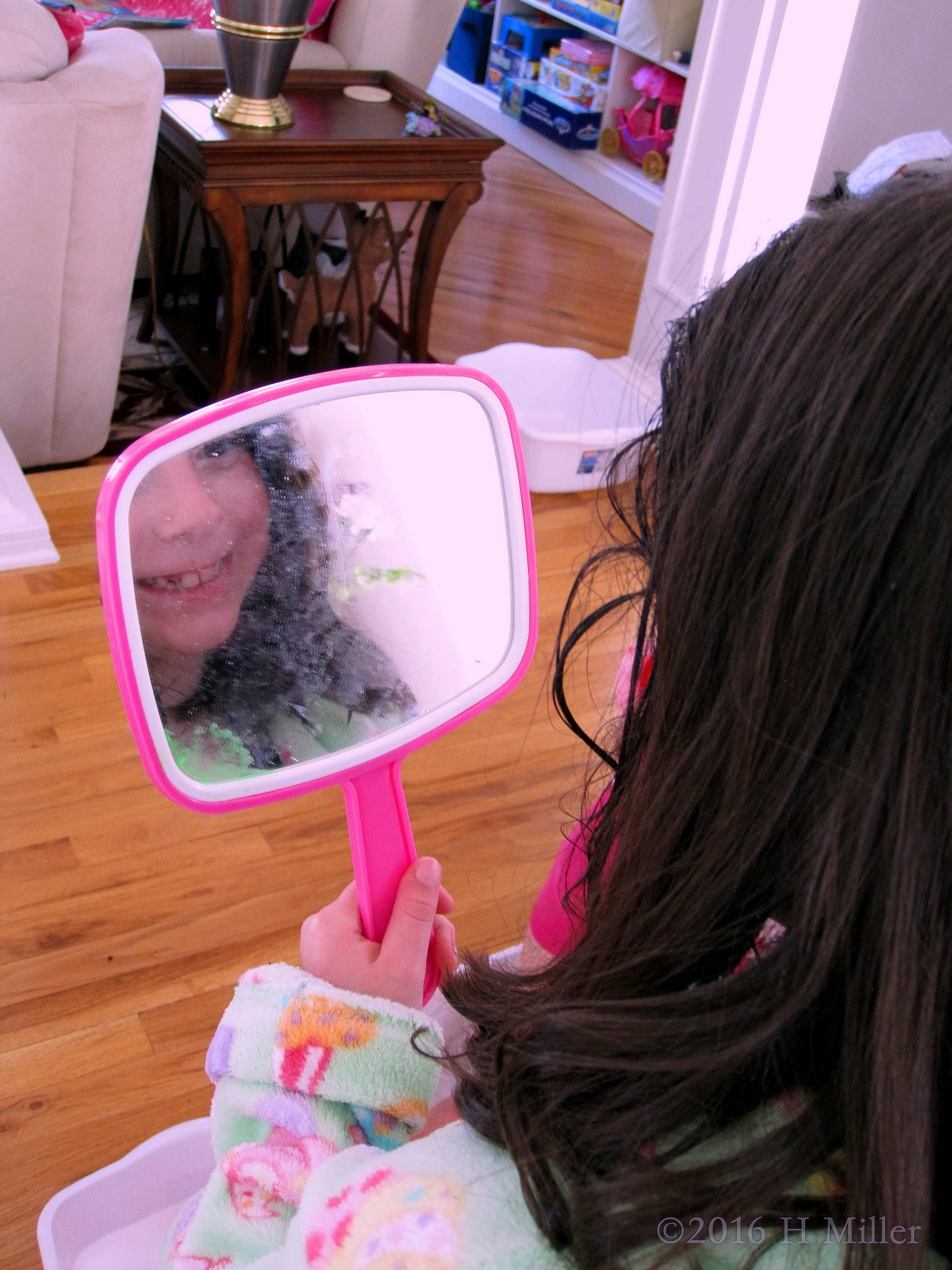 Checking Out Her Kids Hairstyle In The Mirror!