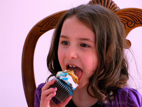 She Looks Like She Is Enjoying That Awesome Spa Party Cupcake!