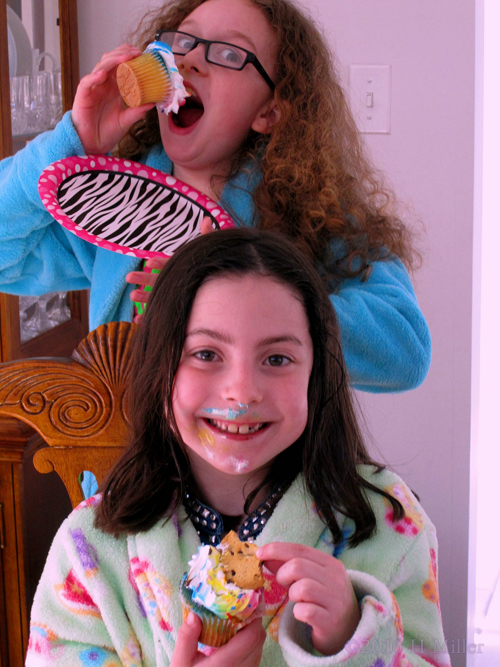 The Girls Are Sure Enjoying Themselves! Eating Spa Party Cupcakes Is Lots Of Fun With Friends!