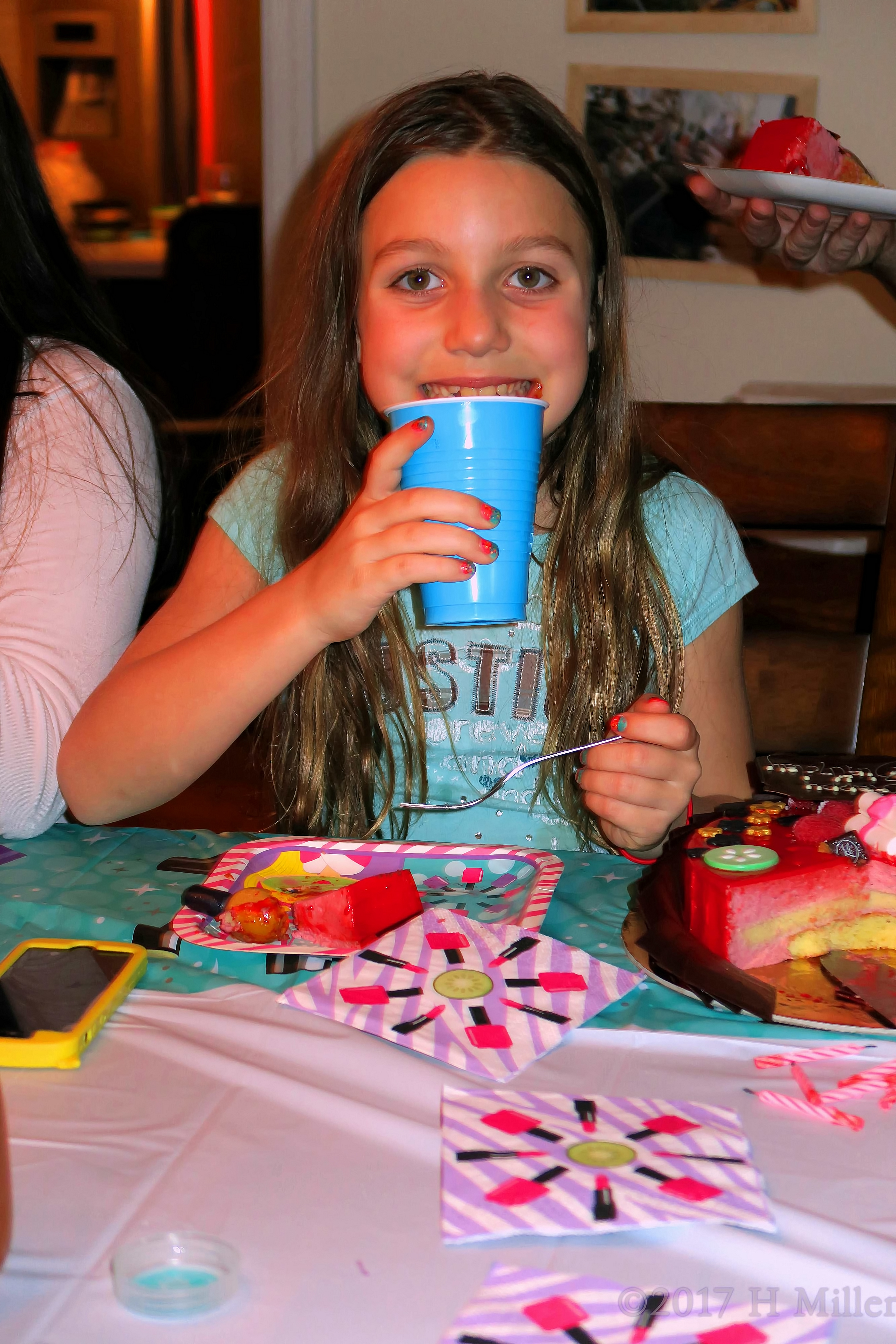 Tessa Enjoying A Slice Of Delicious Cake 