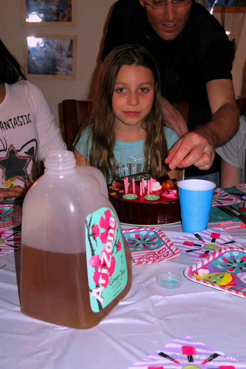 Birthday Girl's Dad Removing Candles From Cake Birthday Girl's Dad Removing Candles From Cake