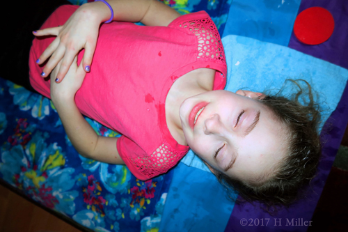 Party Guest Relaxing At Girls Facial Station Party Guest Relaxing At Girls Facial Station