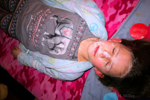 Party Guest Relaxing While Enjoying Her Spa Facial For Kids Party Guest Relaxing While Enjoying Her Spa Facial For Kids