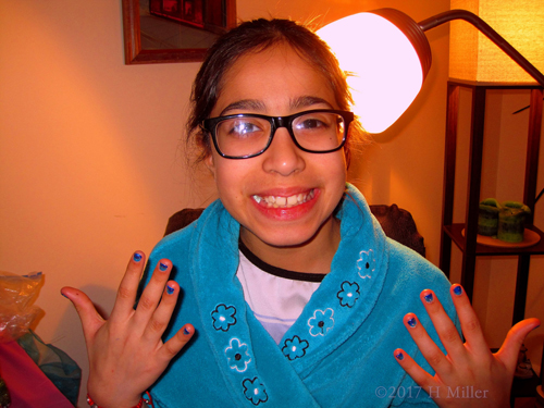 Party Guest Showing Off Her Kids Manicure Party Guest Showing Off Her Kids Manicure