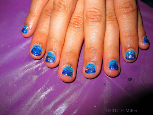 Shades Of Blue Ombre Nail Art With Glitter Overlay 