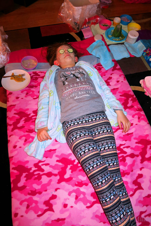 Wide Shot Of Girls Facial Station With Guest Relaxing Wide Shot Of Girls Facial Station With Guest Relaxing