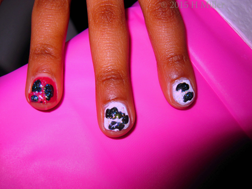 Girls Mani With Abstract Color Patterns.