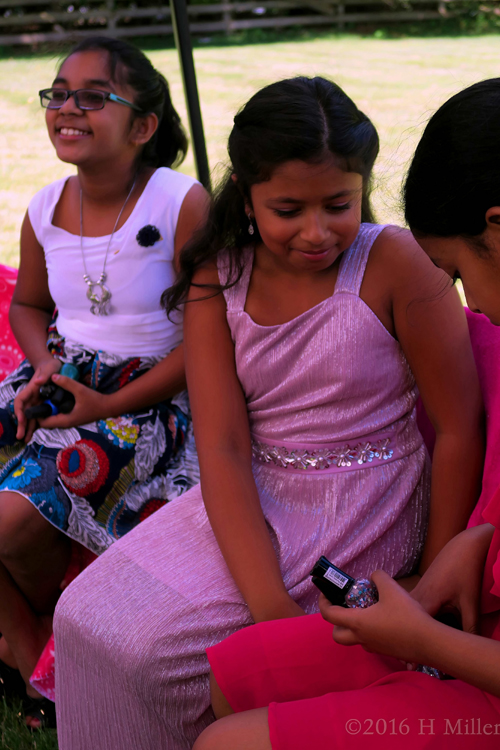 Birthday Girl Chatting With Friends At Her Kids Spa Birthday Girl Chatting With Friends At Her Kids Spa