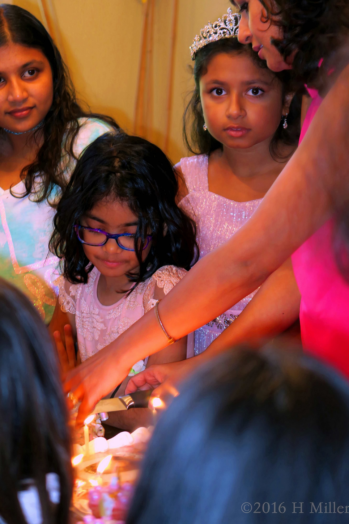Lighting The Candles On The Spa Birthday Cake 