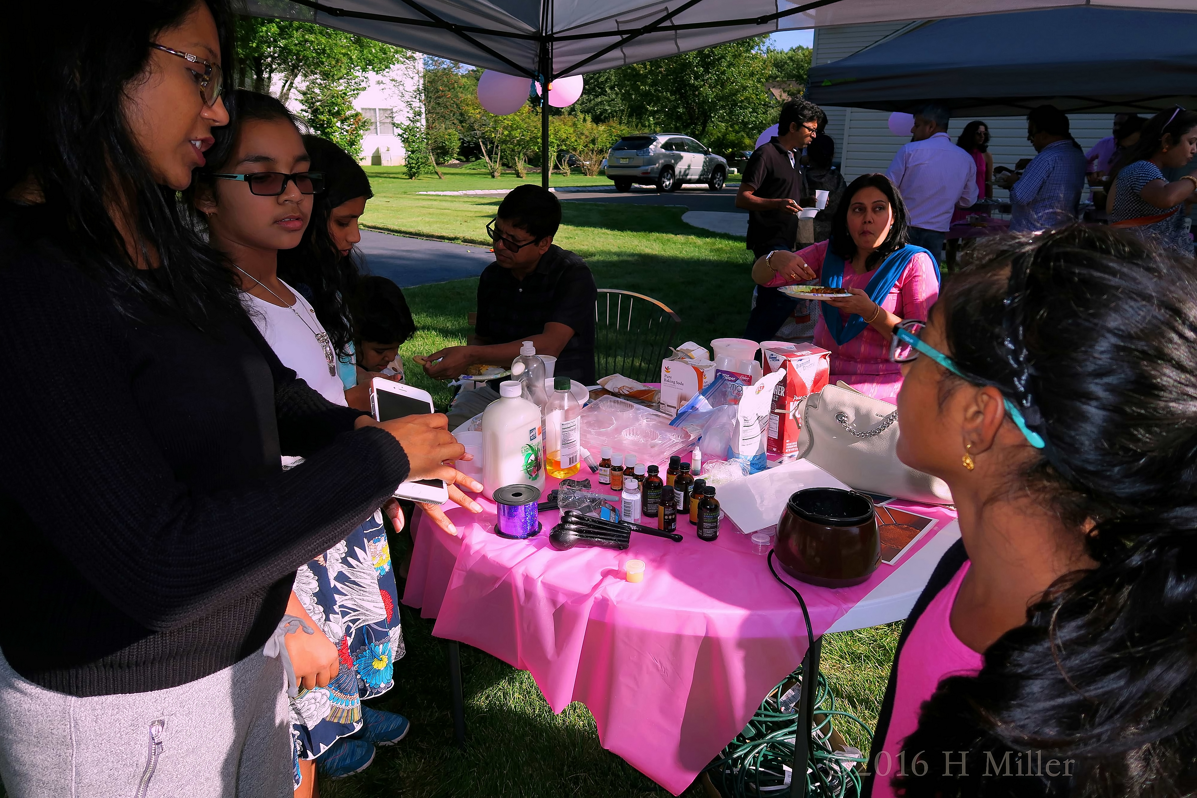 Adults And Kids Having Fun Together Making Kids Craft Projects. Adults And Kids Having Fun Together Making Kids Craft Projects.