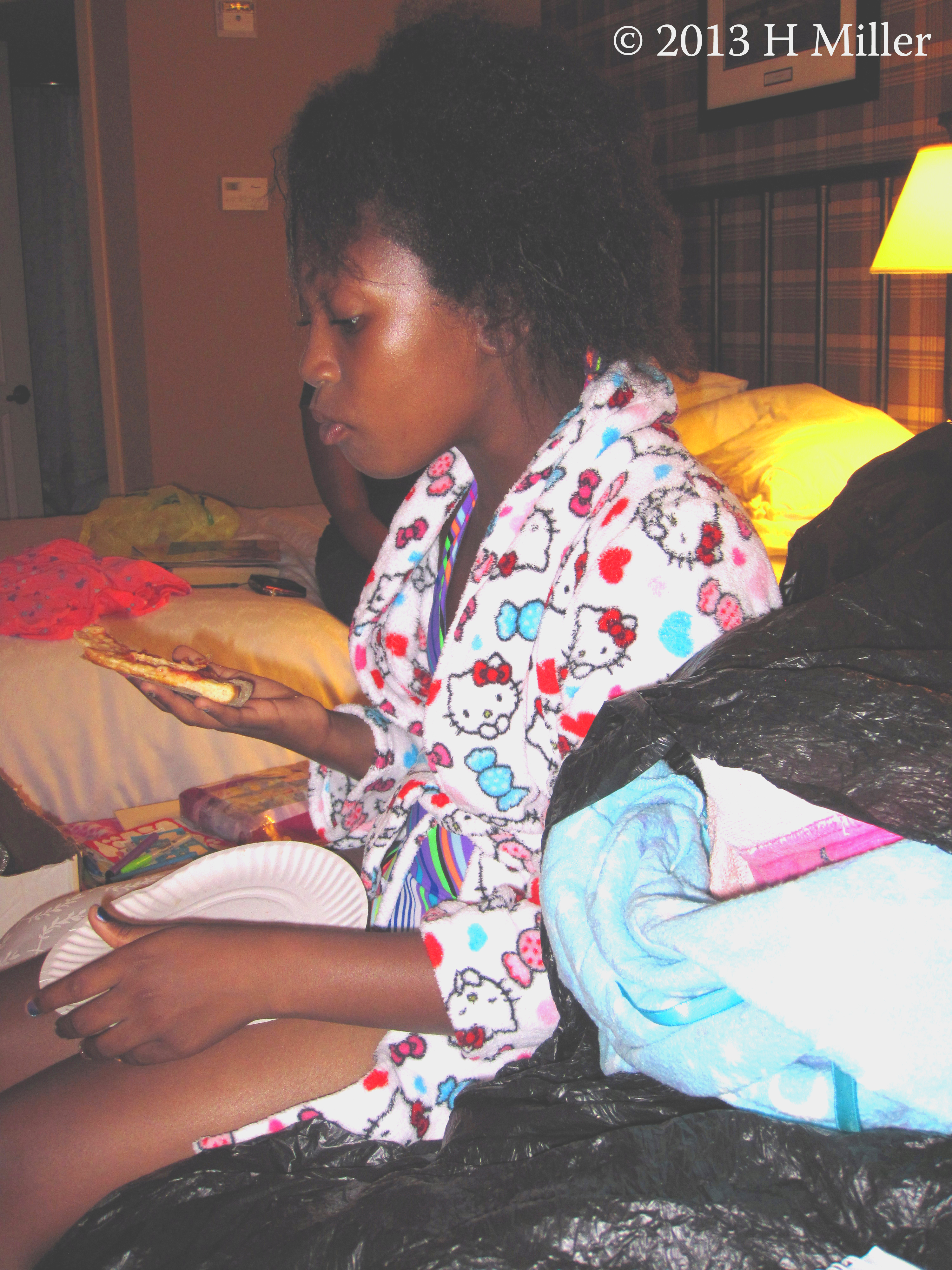 Eating Pizza During Her Hotel Spa Birthday Party. Eating Pizza During Her Hotel Spa Birthday Party.