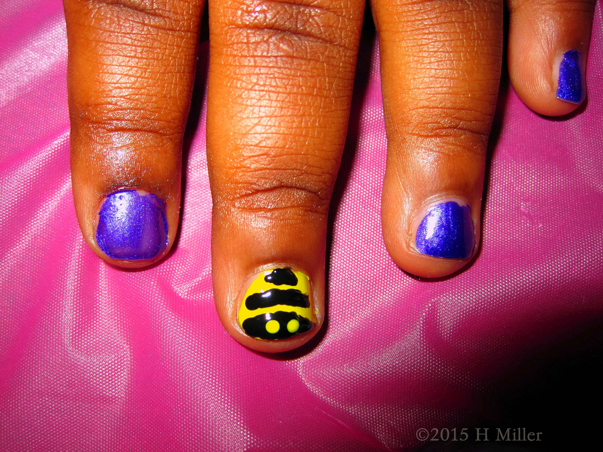 Close Up Of The Bee Design On The Other Hand 