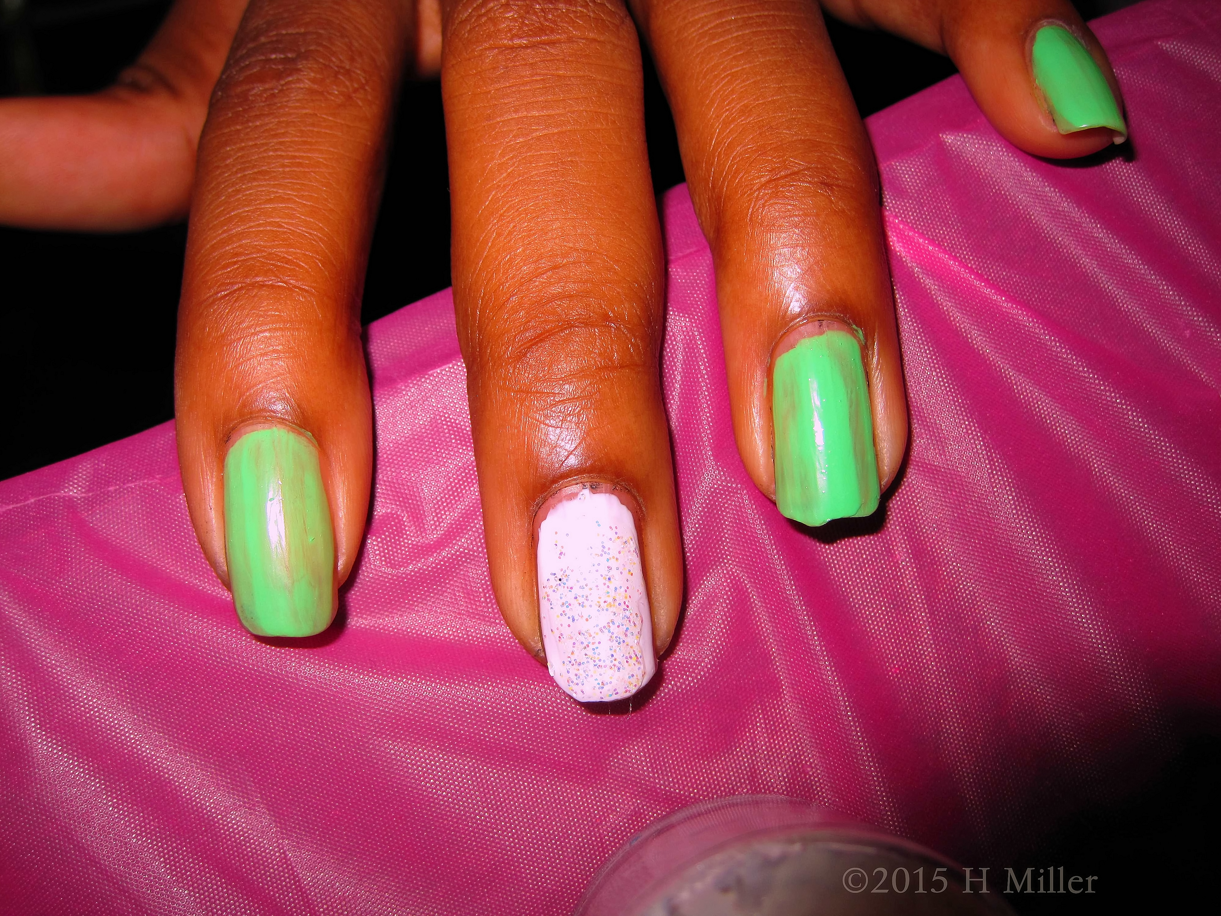 Close Up Of Green And White Polish Close Up Of Green And White Polish