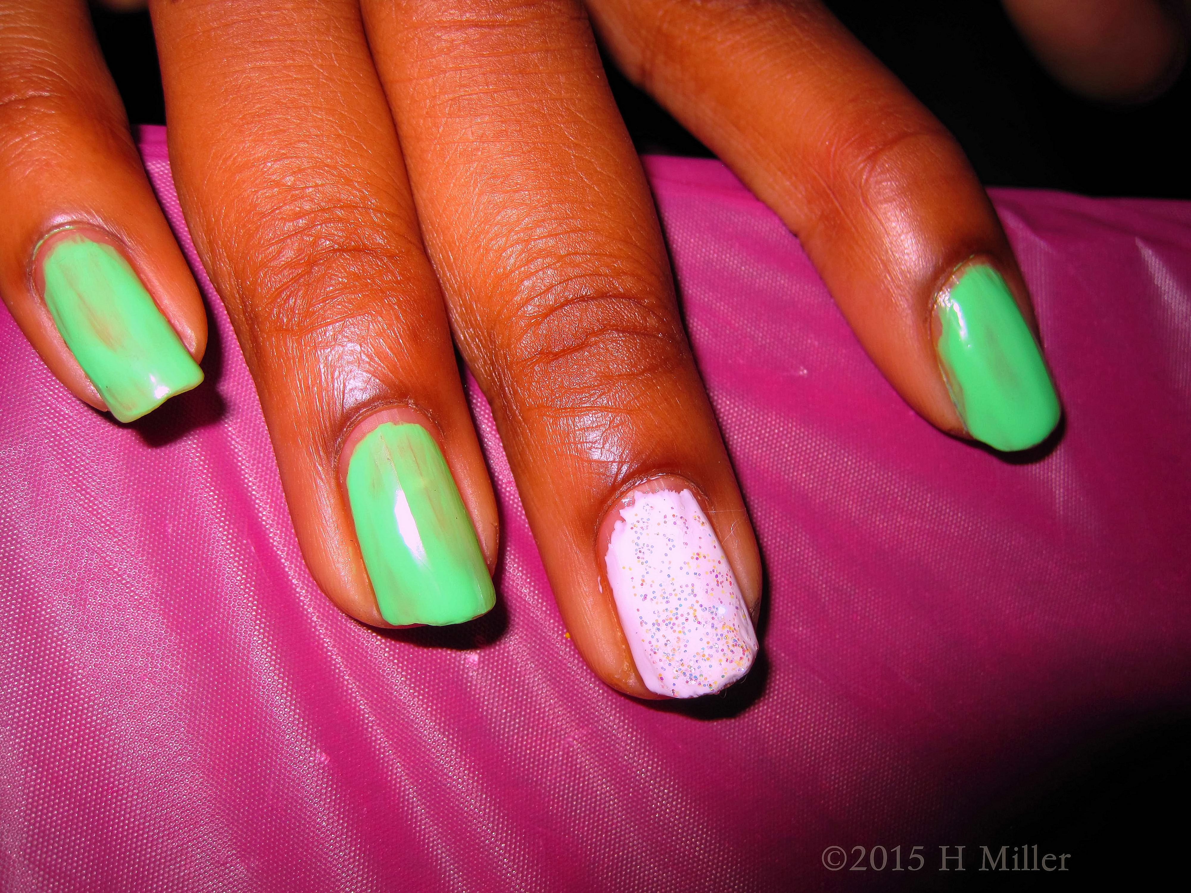 Pretty Nail Polish Green And White With Glitter. Pretty Nail Polish Green And White With Glitter.