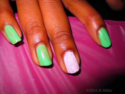 Pretty Nail Polish Green And White With Glitter. Pretty Nail Polish Green And White With Glitter.