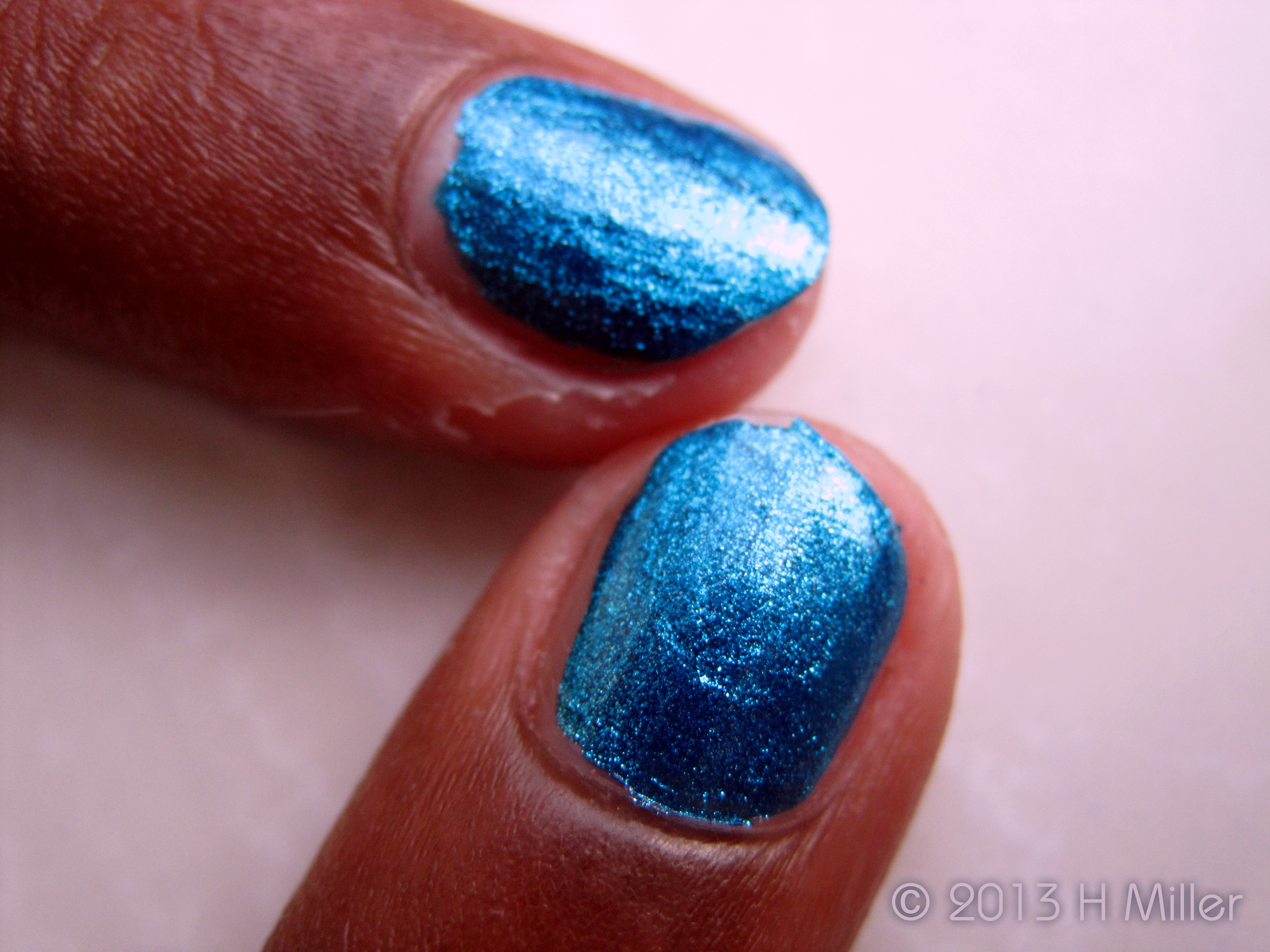 Metallic Blue Nail Ploish Close Up 